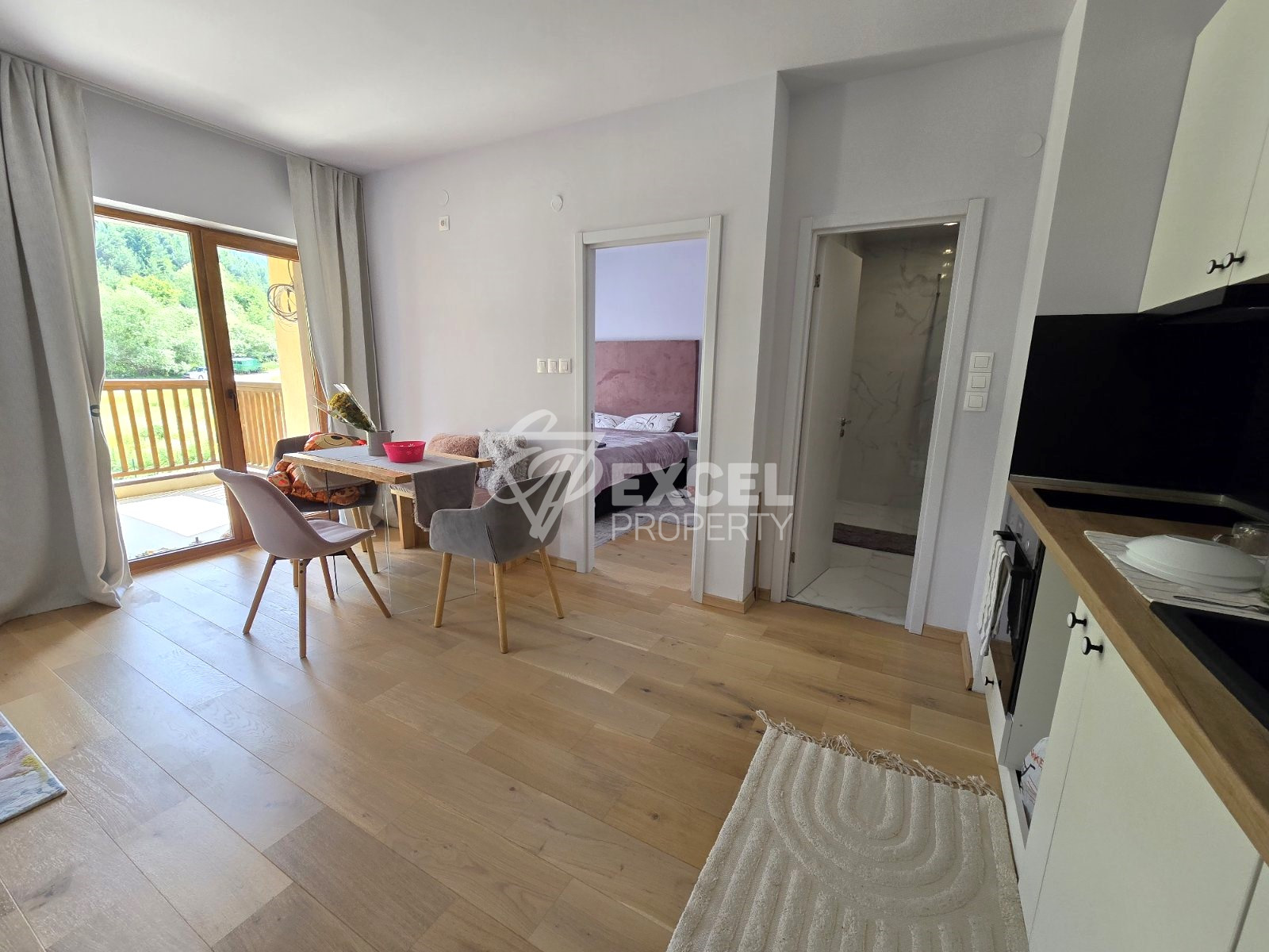Luxuriously furnished one bedroom apartment with south exposure and a wonderful panoramic view