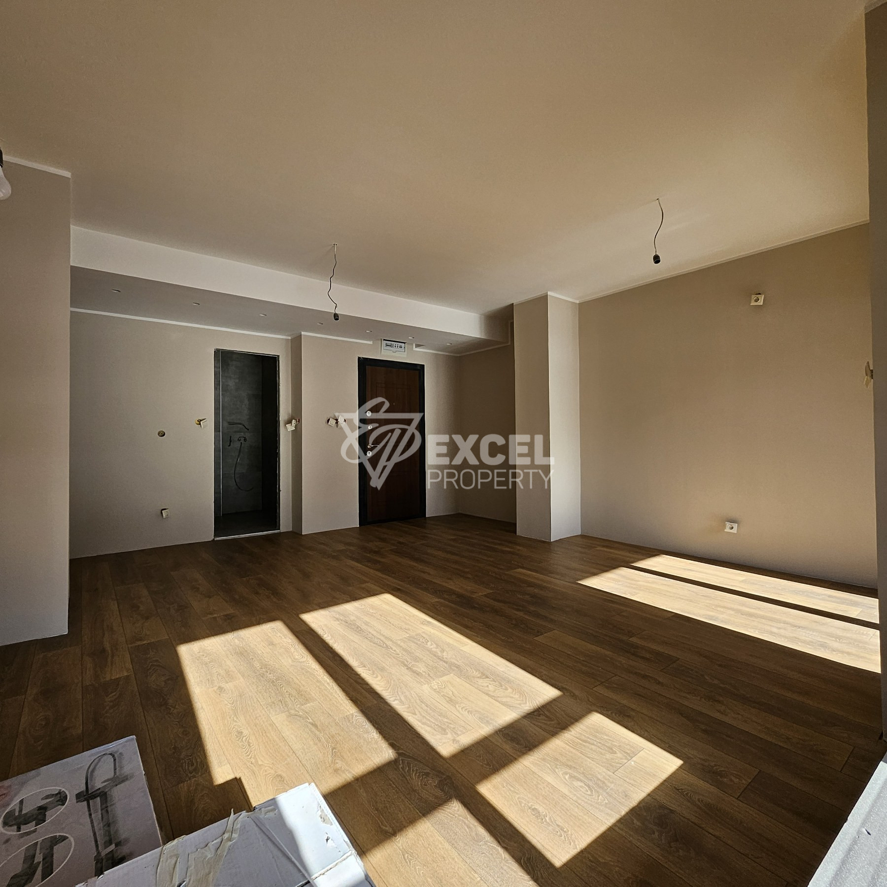 Spacious southern studio for sale in a residential building with low maintenance fees, Bansko
