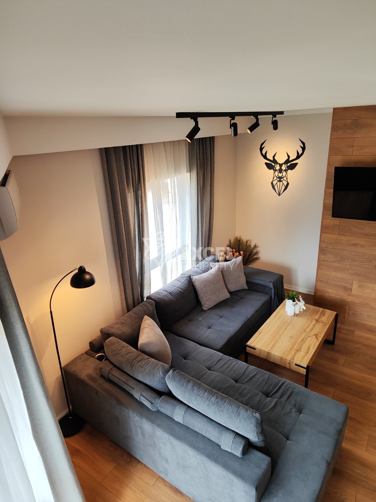 Elegantly furnished two-bedroom apartment with a low maintenance fee