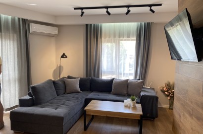 Elegantly furnished two-bedroom apartment with a low maintenance fee