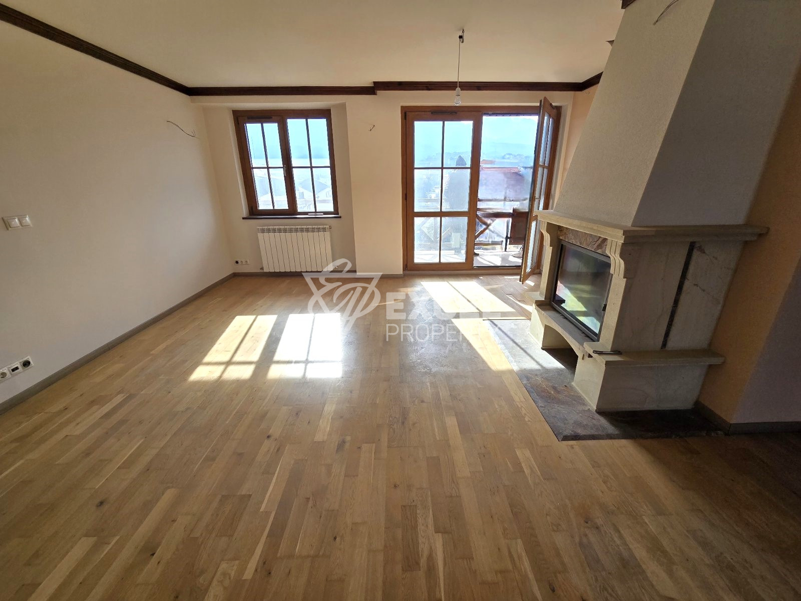 Spacious south-facing two-bedroom apartment for sale in Bansko, near the stadium