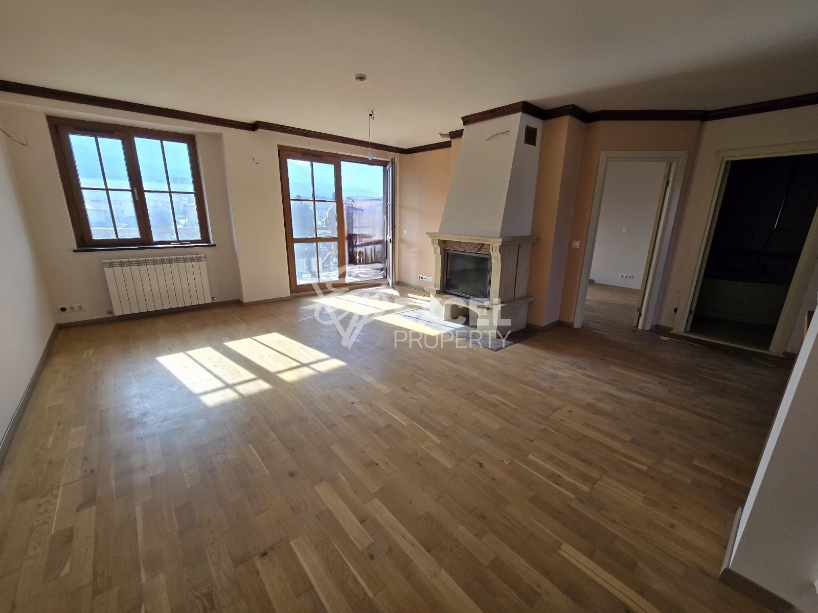 Spacious south-facing two-bedroom apartment for sale in Bansko, near the stadium