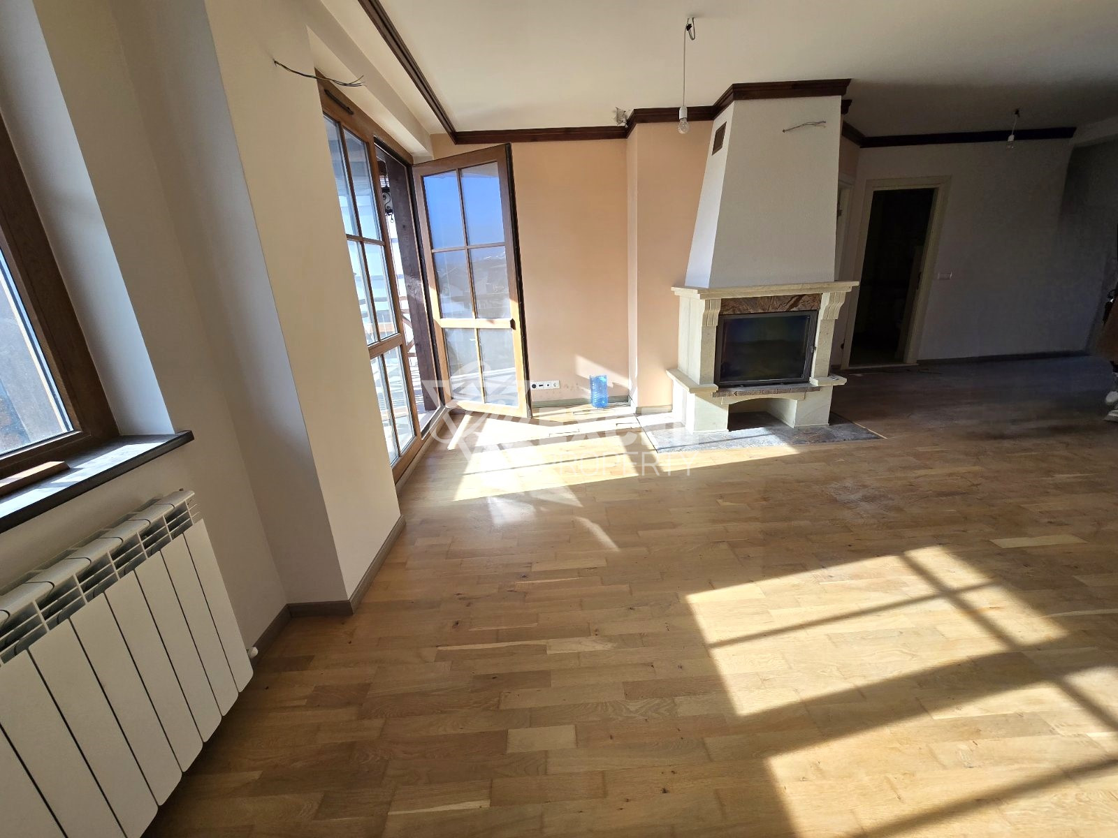 Spacious south-facing two-bedroom apartment for sale in Bansko, near the stadium