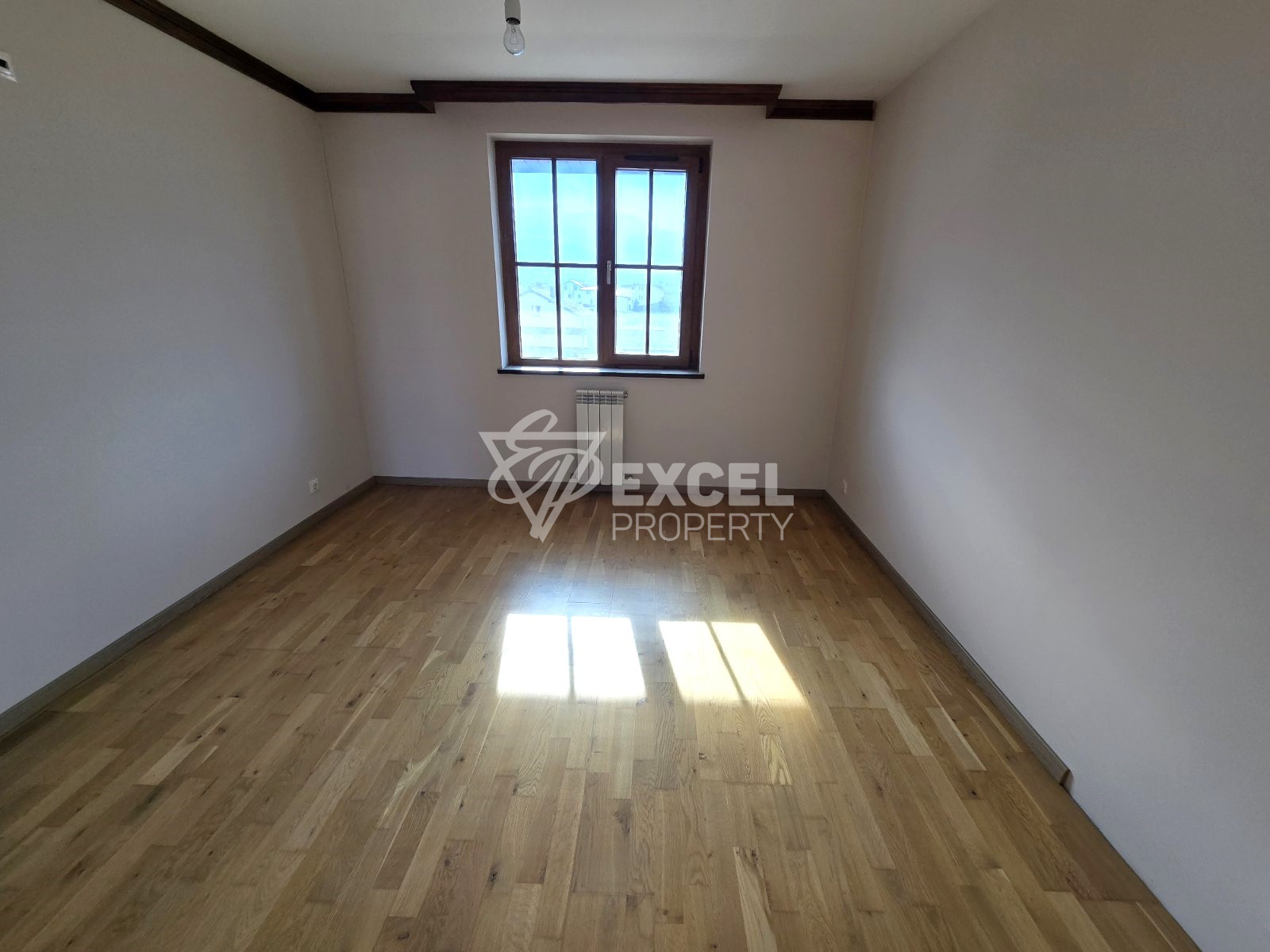 Spacious south-facing two-bedroom apartment for sale in Bansko, near the stadium