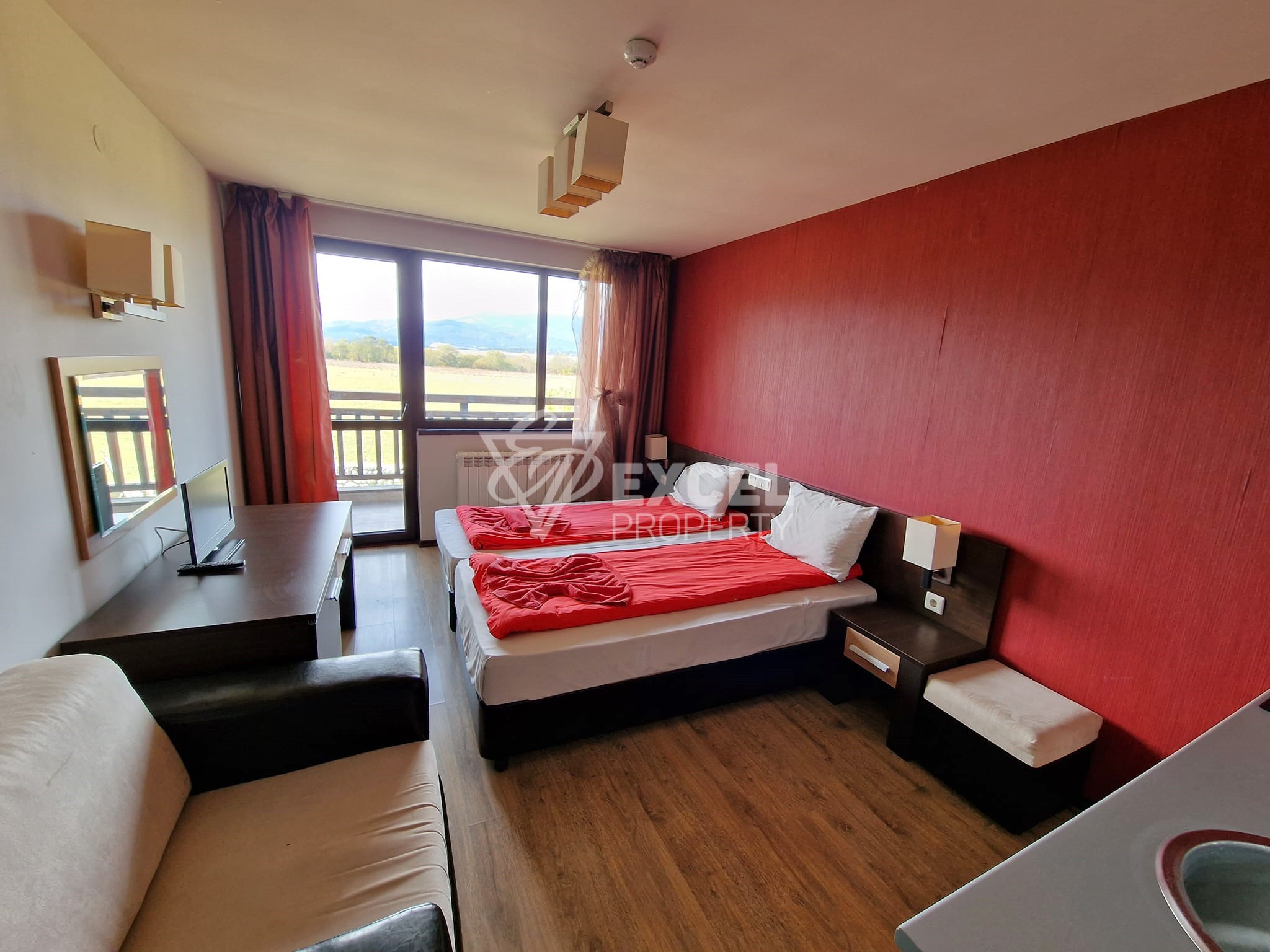 Studio with a beautiful view of Pirin for sale between Bansko and Banya! Low maintenance fee!