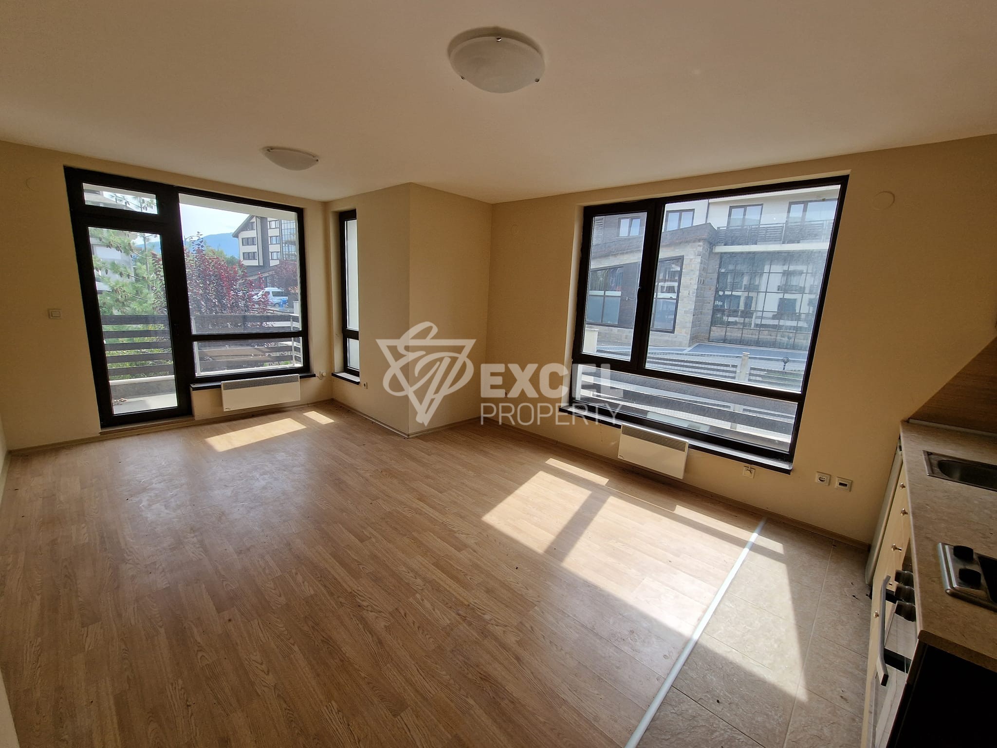 Semi-furnished two-room apartment in a gated complex with a pool, Razlog area