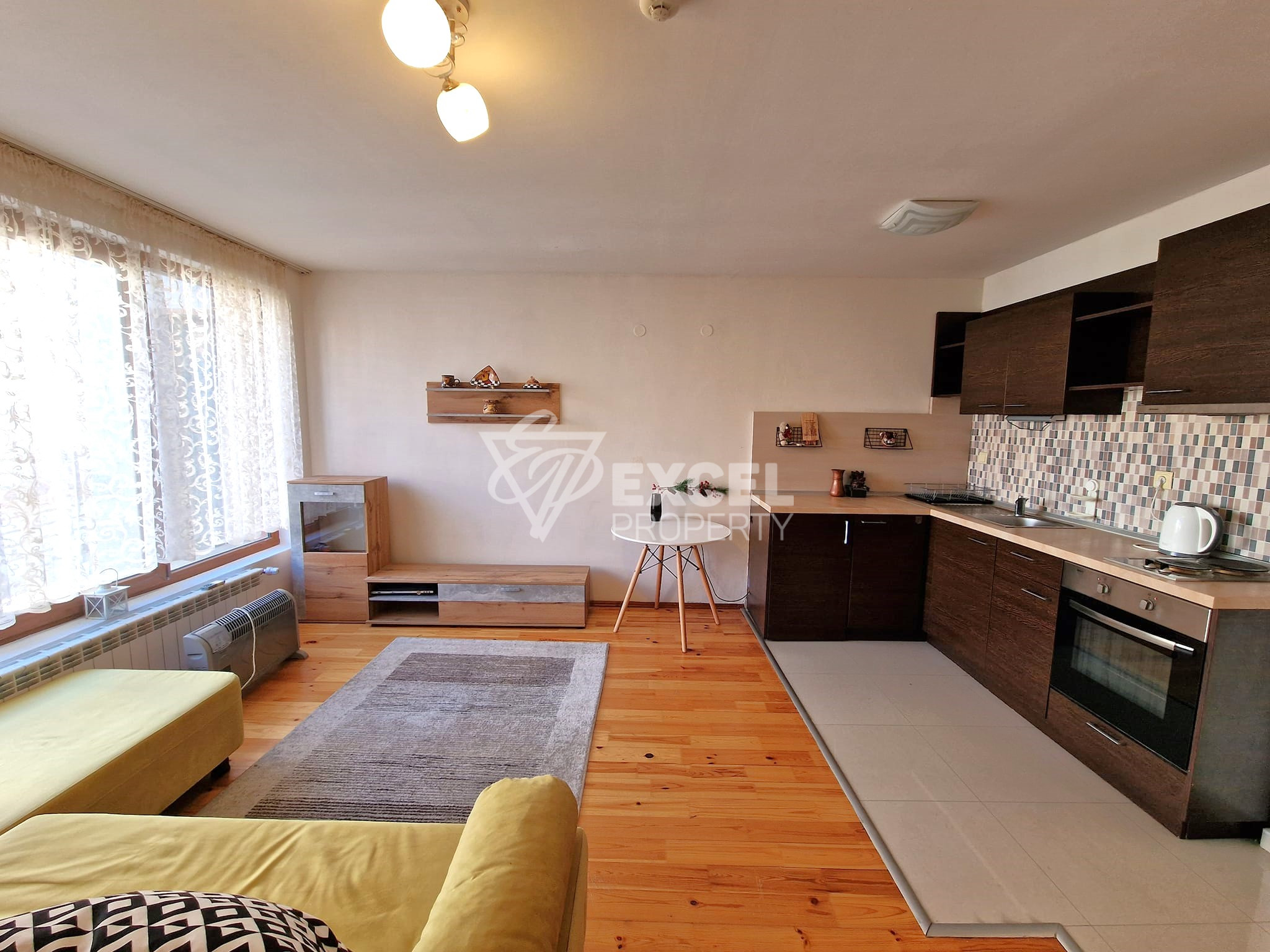 Affordable studio with east facing terrace in a building with low maintenance fee for sale in Bansko