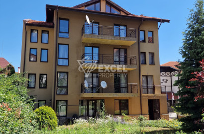 A maisonette apartment in a building with a low maintenance fee next to the Tane hotel