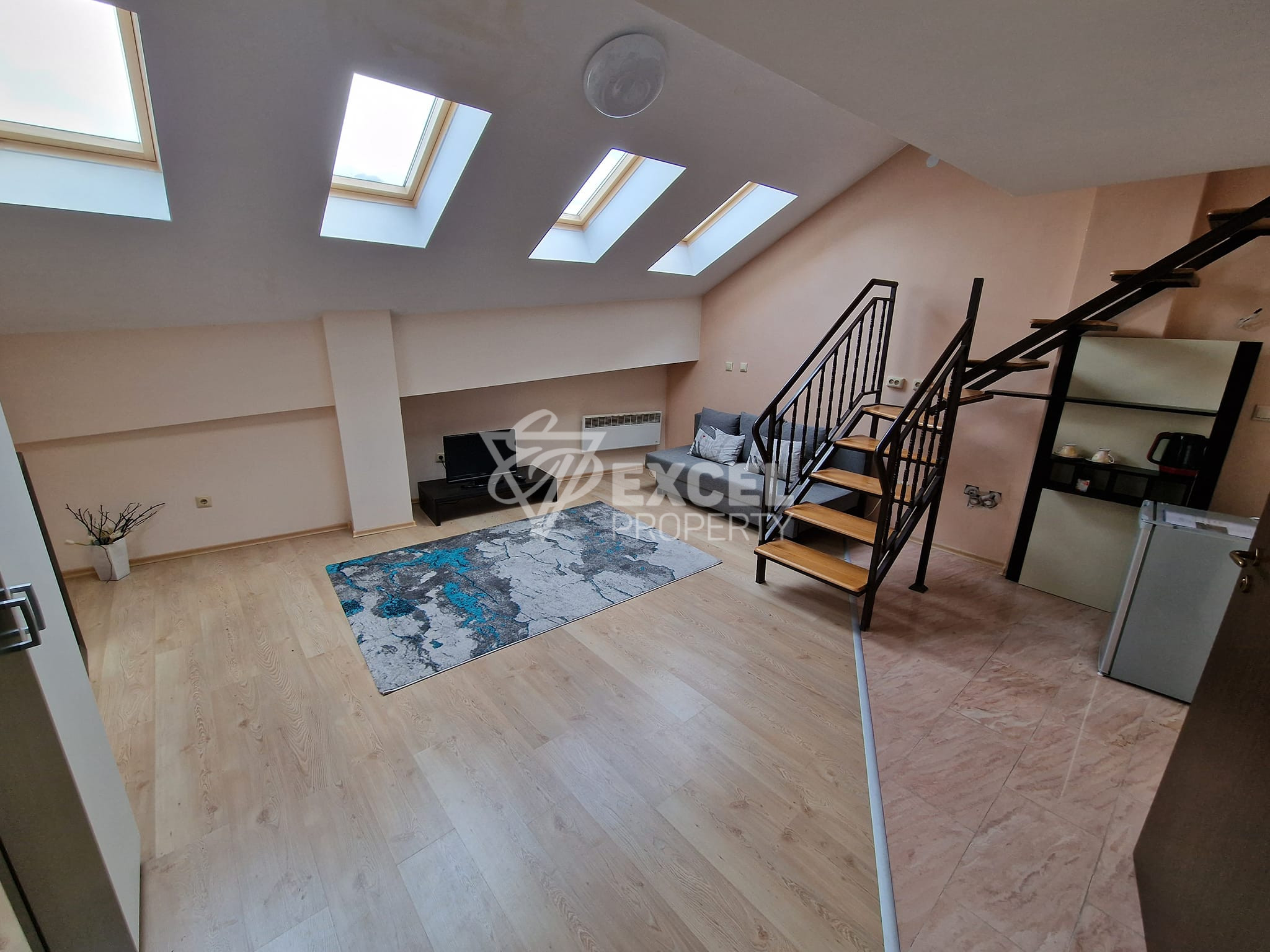 A maisonette apartment in a building with a low maintenance fee next to the Tane hotel