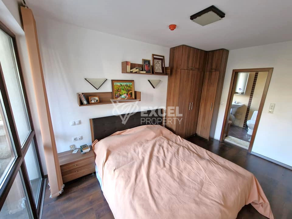 Exclusive two bedroom apartment with a fireplace at a bargain price for sale in Bansko
