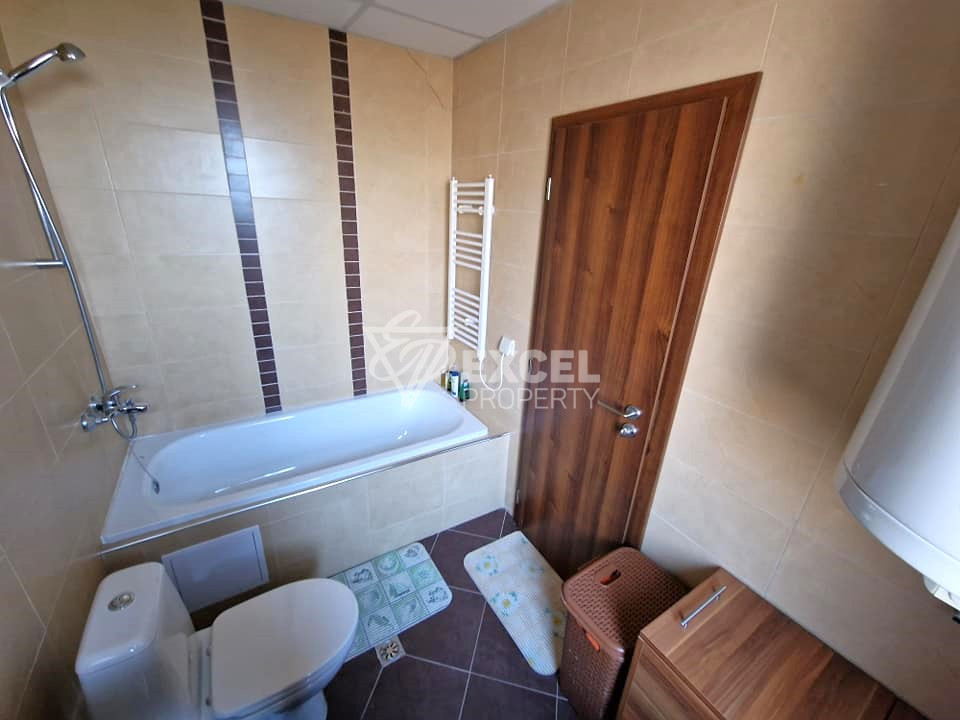 Exclusive two bedroom apartment with a fireplace at a bargain price for sale in Bansko