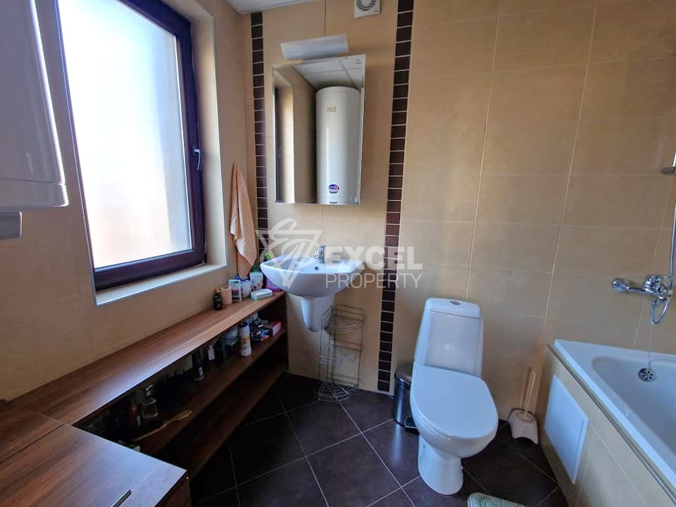 Exclusive two bedroom apartment with a fireplace at a bargain price for sale in Bansko