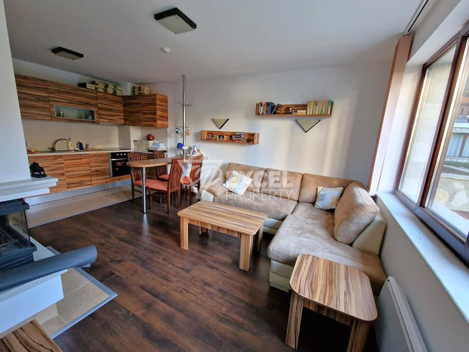 Exclusive two bedroom apartment with a fireplace at a bargain price for sale in Bansko