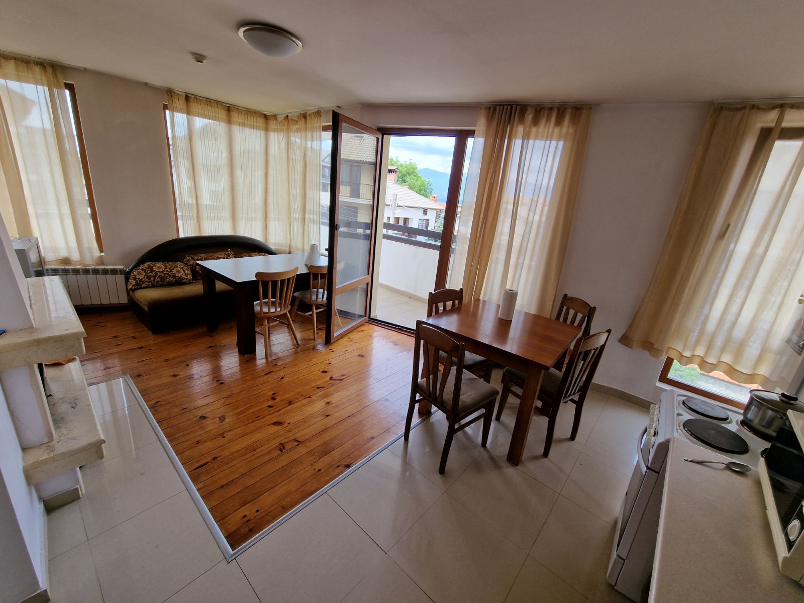 Spacious apartment with two bedrooms and a parking space in a well-maintained complex in Bansko