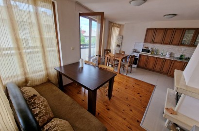 Spacious apartment with two bedrooms and a parking space in a well-maintained complex in Bansko