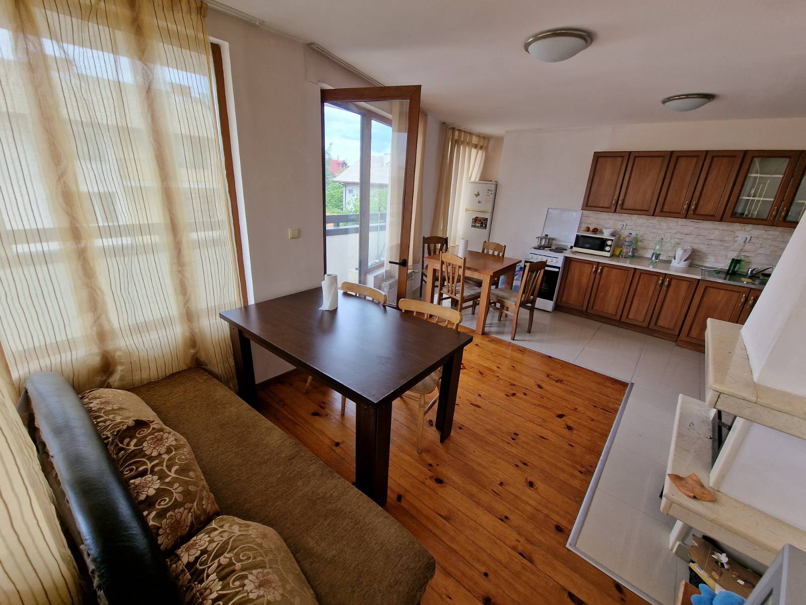 Spacious apartment with two bedrooms and a parking space in a well-maintained complex in Bansko