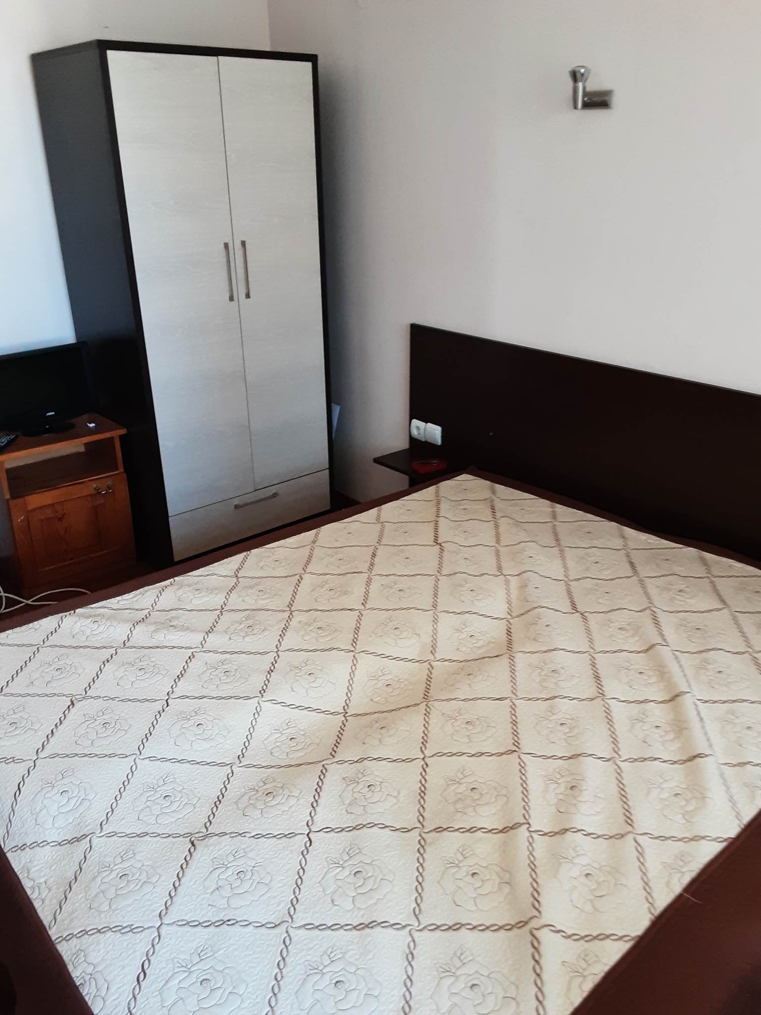Spacious apartment with two bedrooms and a parking space in a well-maintained complex in Bansko