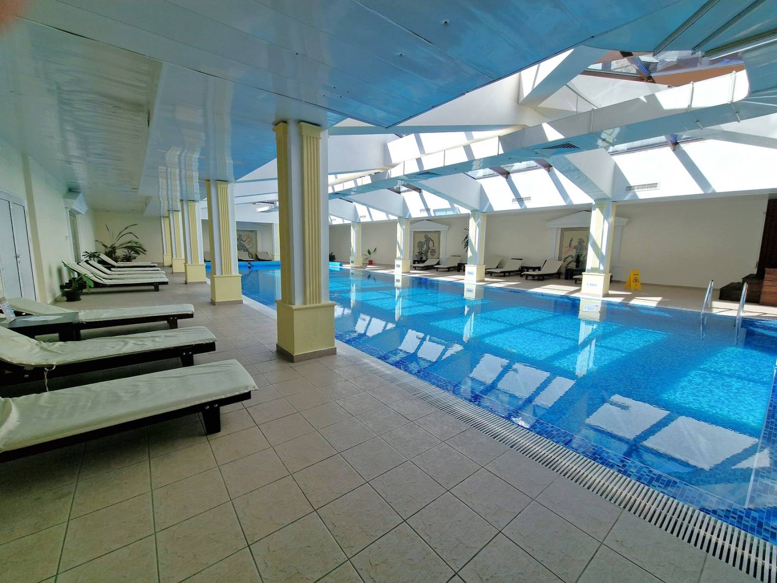 A modern, cozy two bedroom apartment with new furniture and a frontal view of the Pirin Mountains
