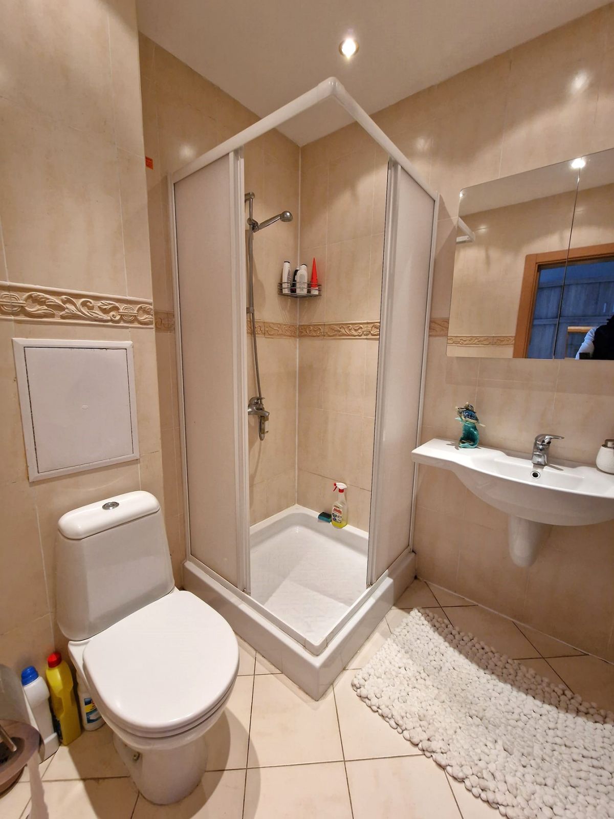 A modern, cozy two bedroom apartment with new furniture and a frontal view of the Pirin Mountains