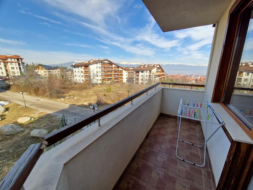 A unique three bedroom apartment with a stunning view of three mountains and the city of Bansko