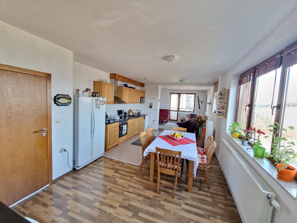 A unique three bedroom apartment with a stunning view of three mountains and the city of Bansko