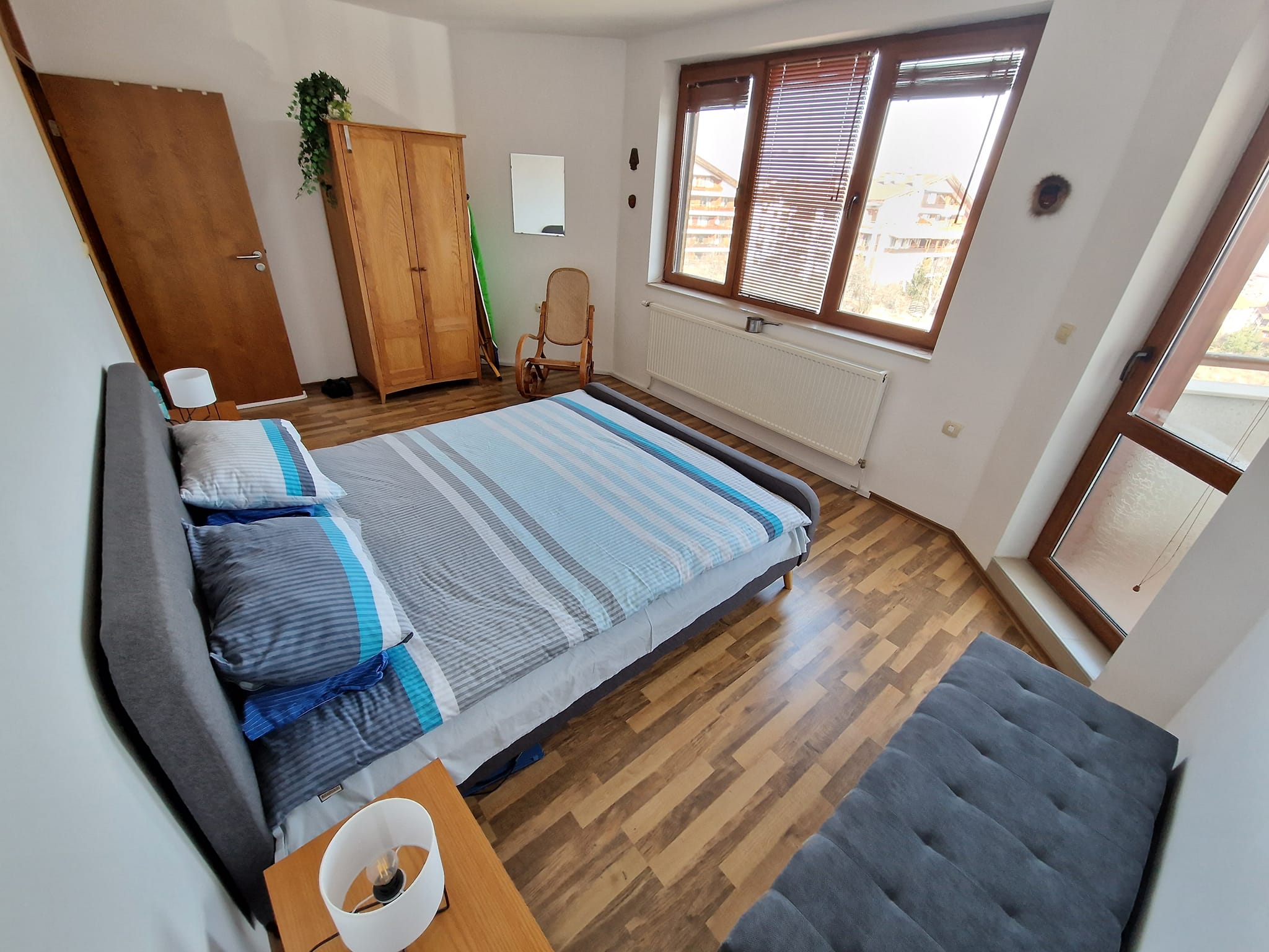 A unique three bedroom apartment with a stunning view of three mountains and the city of Bansko