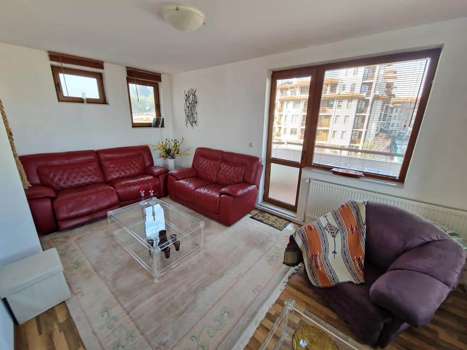 A unique three bedroom apartment with a stunning view of three mountains and the city of Bansko