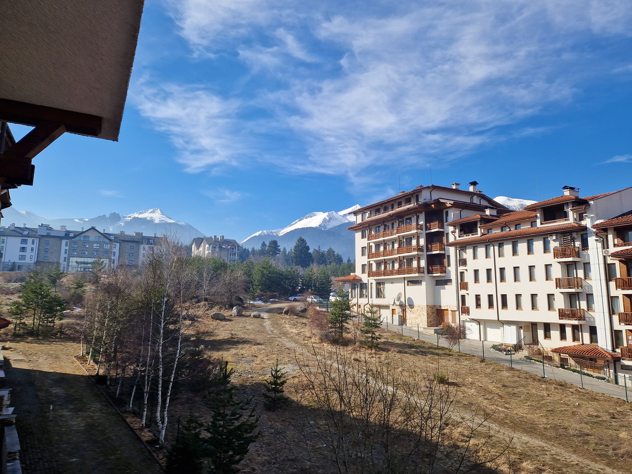 A unique three bedroom apartment with a stunning view of three mountains and the city of Bansko