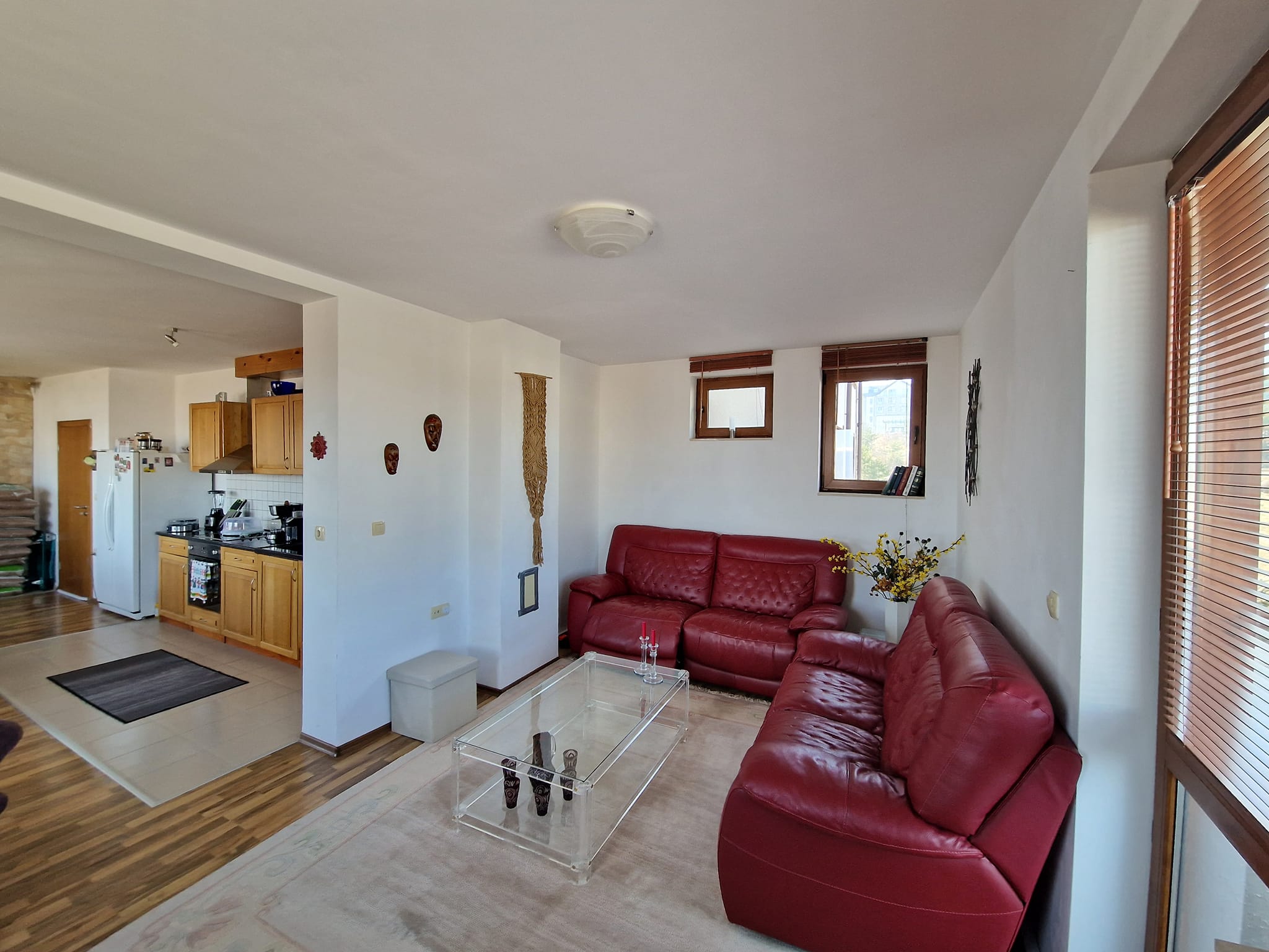 A unique three bedroom apartment with a stunning view of three mountains and the city of Bansko