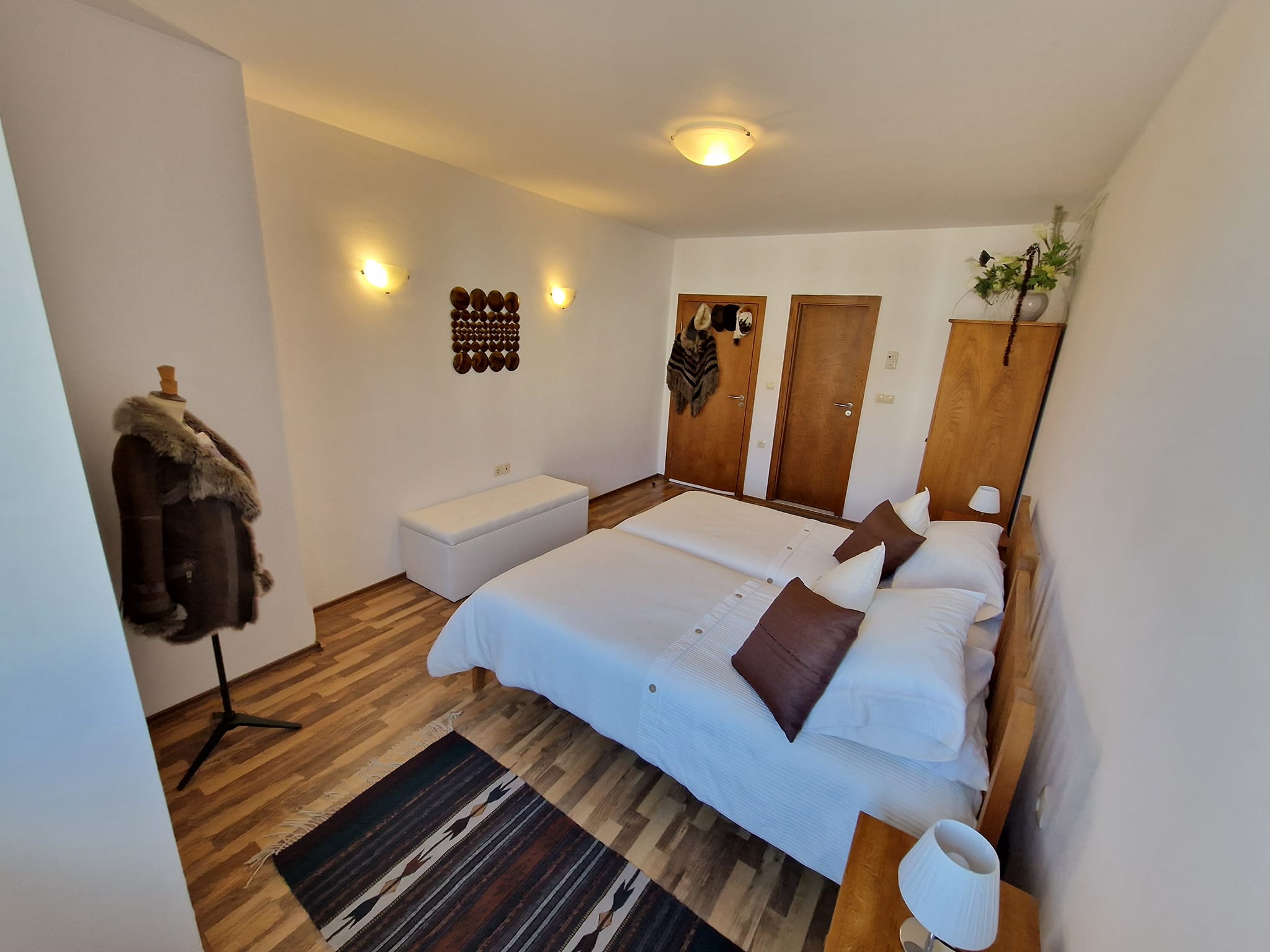 A unique three bedroom apartment with a stunning view of three mountains and the city of Bansko