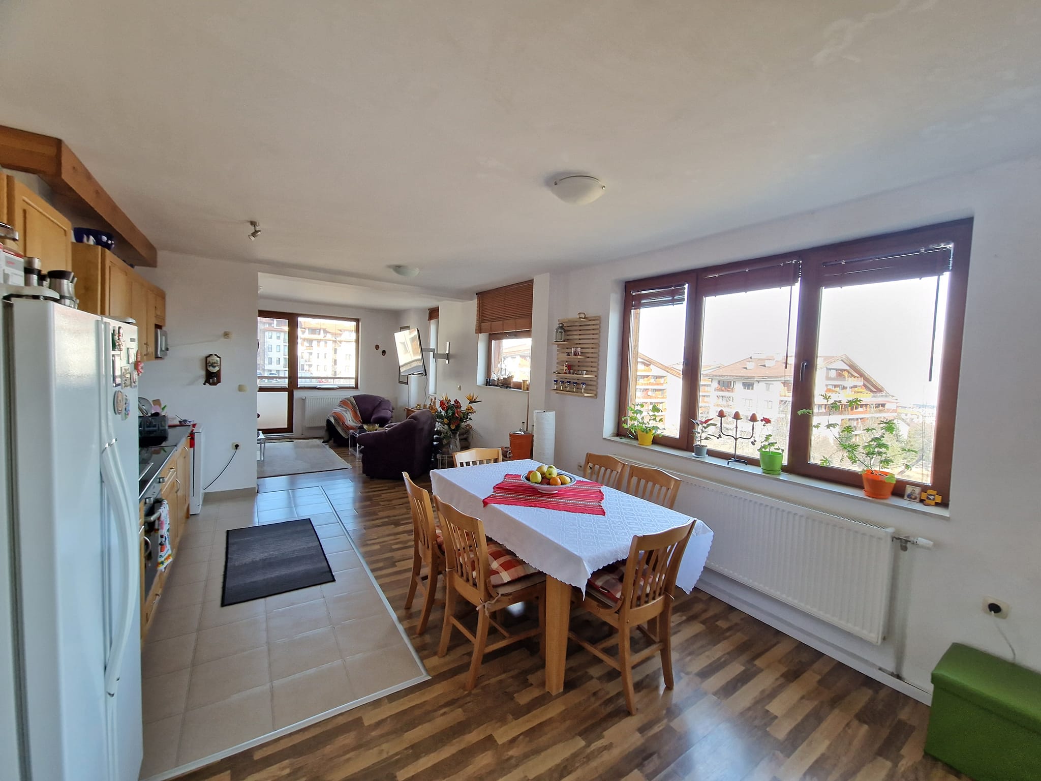 A unique three bedroom apartment with a stunning view of three mountains and the city of Bansko