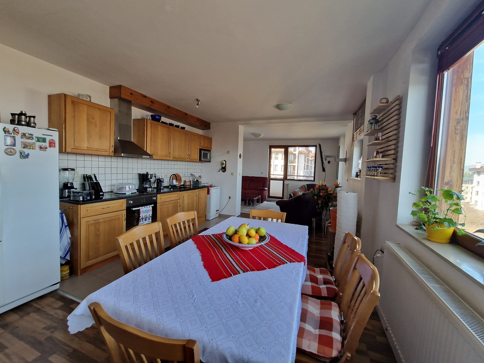 A unique three bedroom apartment with a stunning view of three mountains and the city of Bansko