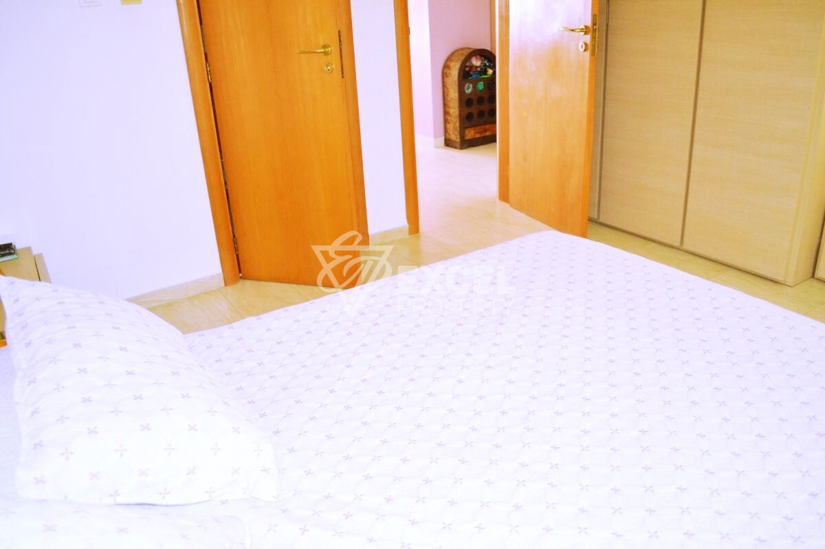 Two-bedroom property on the first line - sea, pool and mountain views