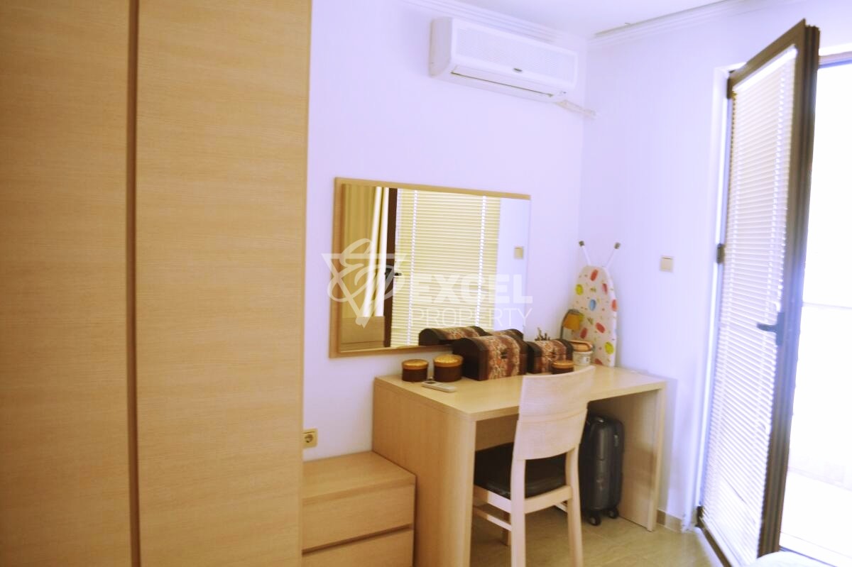 Two-bedroom property on the first line - sea, pool and mountain views