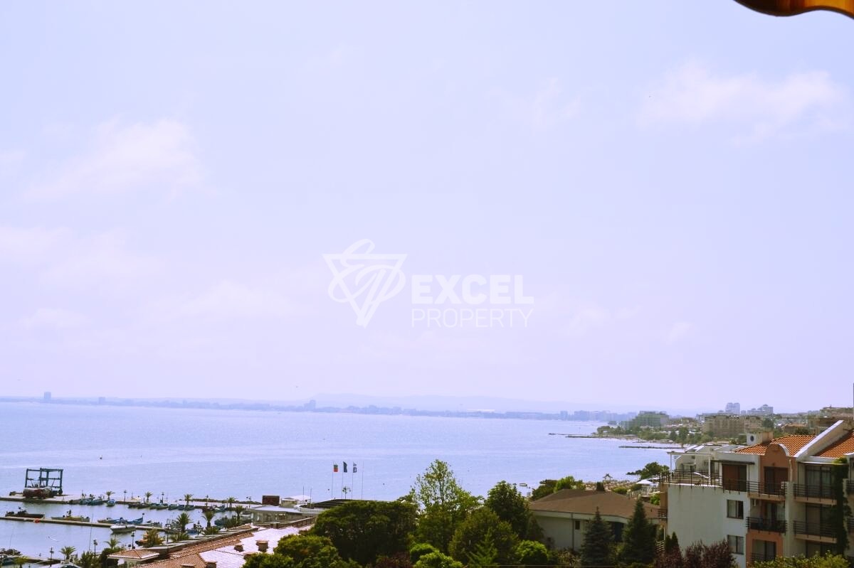 Two-bedroom property on the first line - sea, pool and mountain views