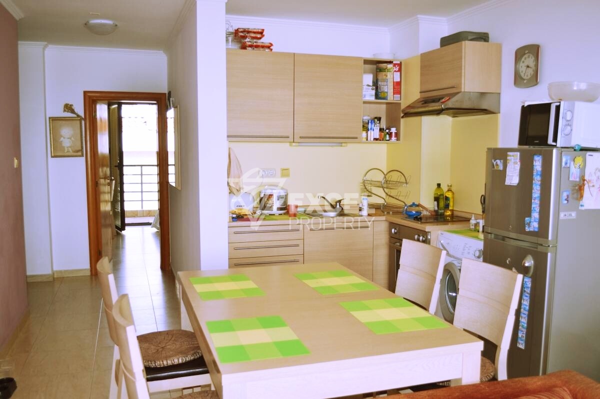 Two-bedroom property on the first line - sea, pool and mountain views