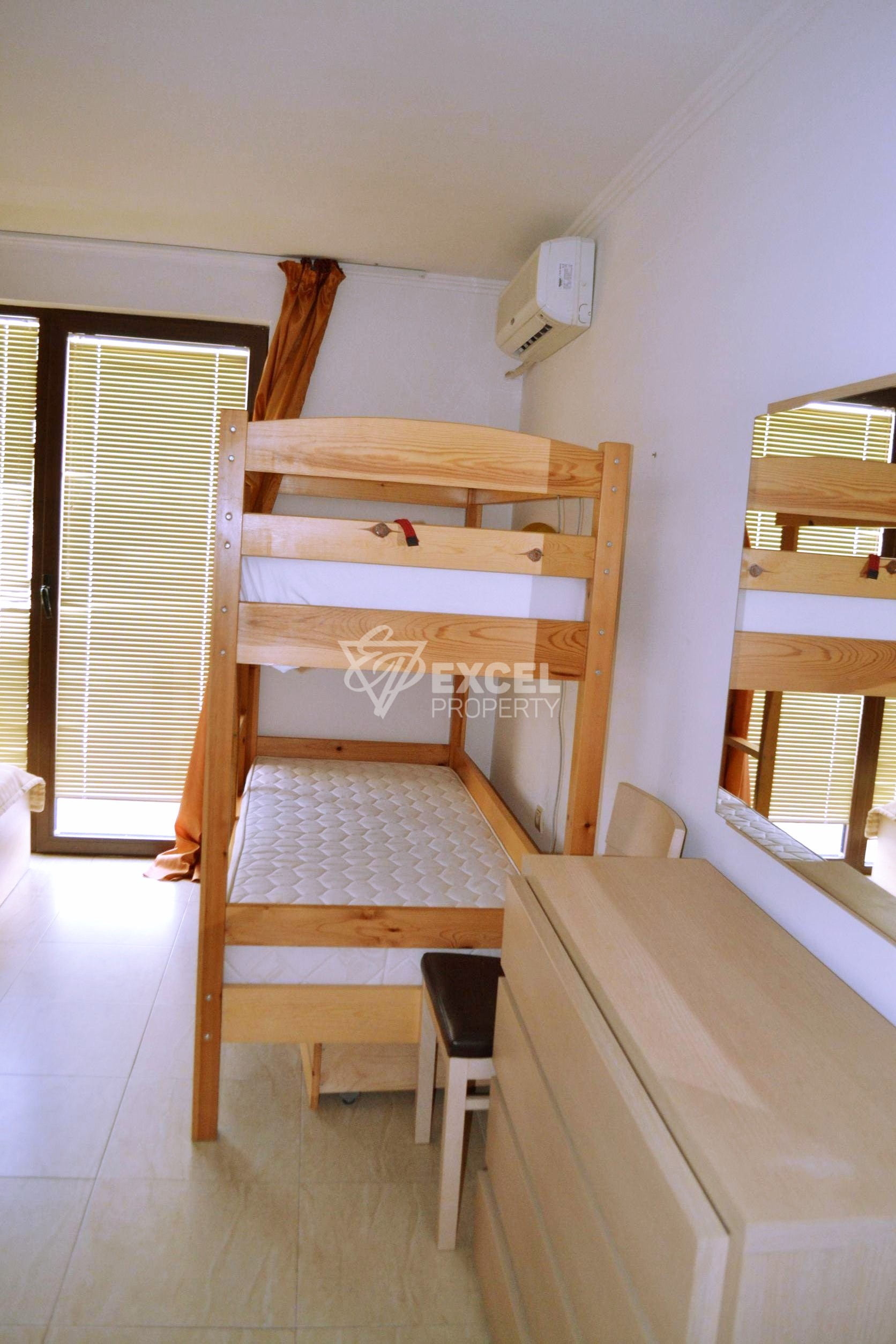 Two-bedroom property on the first line - sea, pool and mountain views