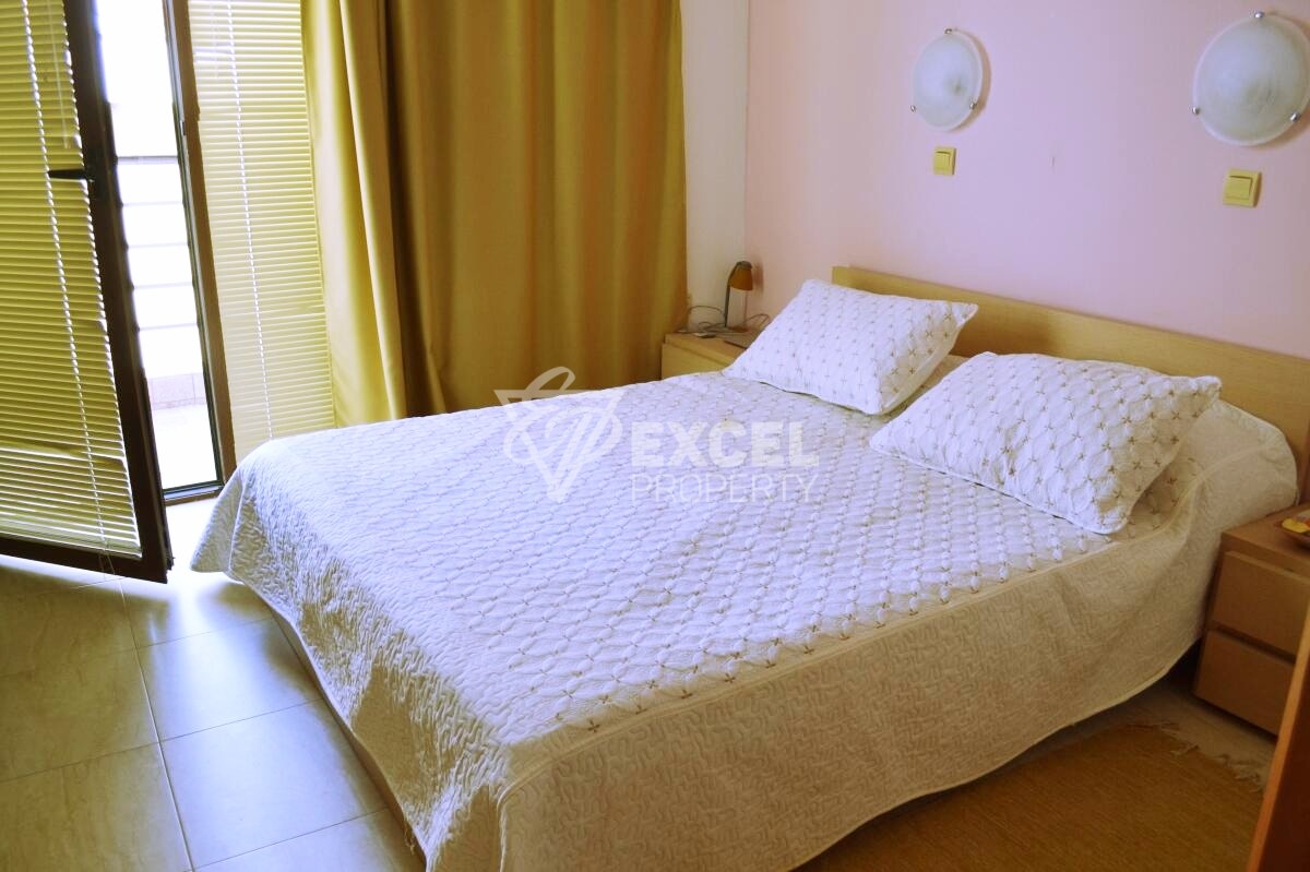 Two-bedroom property on the first line - sea, pool and mountain views
