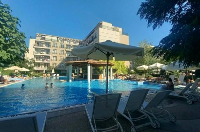 One-bedroom property in Down Park complex with pool view